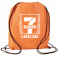 Orange backpack with 7-Eleven Cares Day logo in white